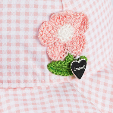 Cappello corolla a quadretti con fiore
